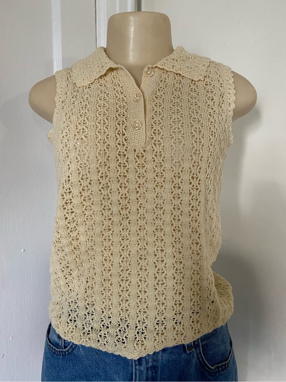 Cream crochet knit polo top with vertical floral lace pattern